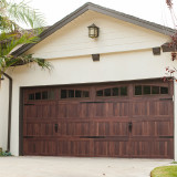 Carriage-accents-arched-madison-Steel-Door